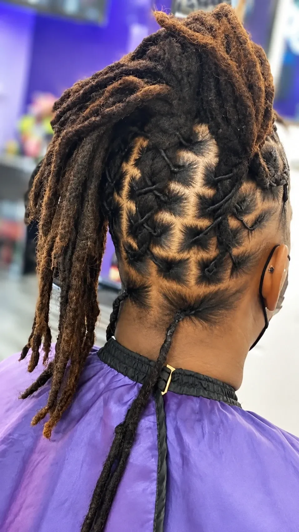 Finished loc style with a clean geometric section pattern