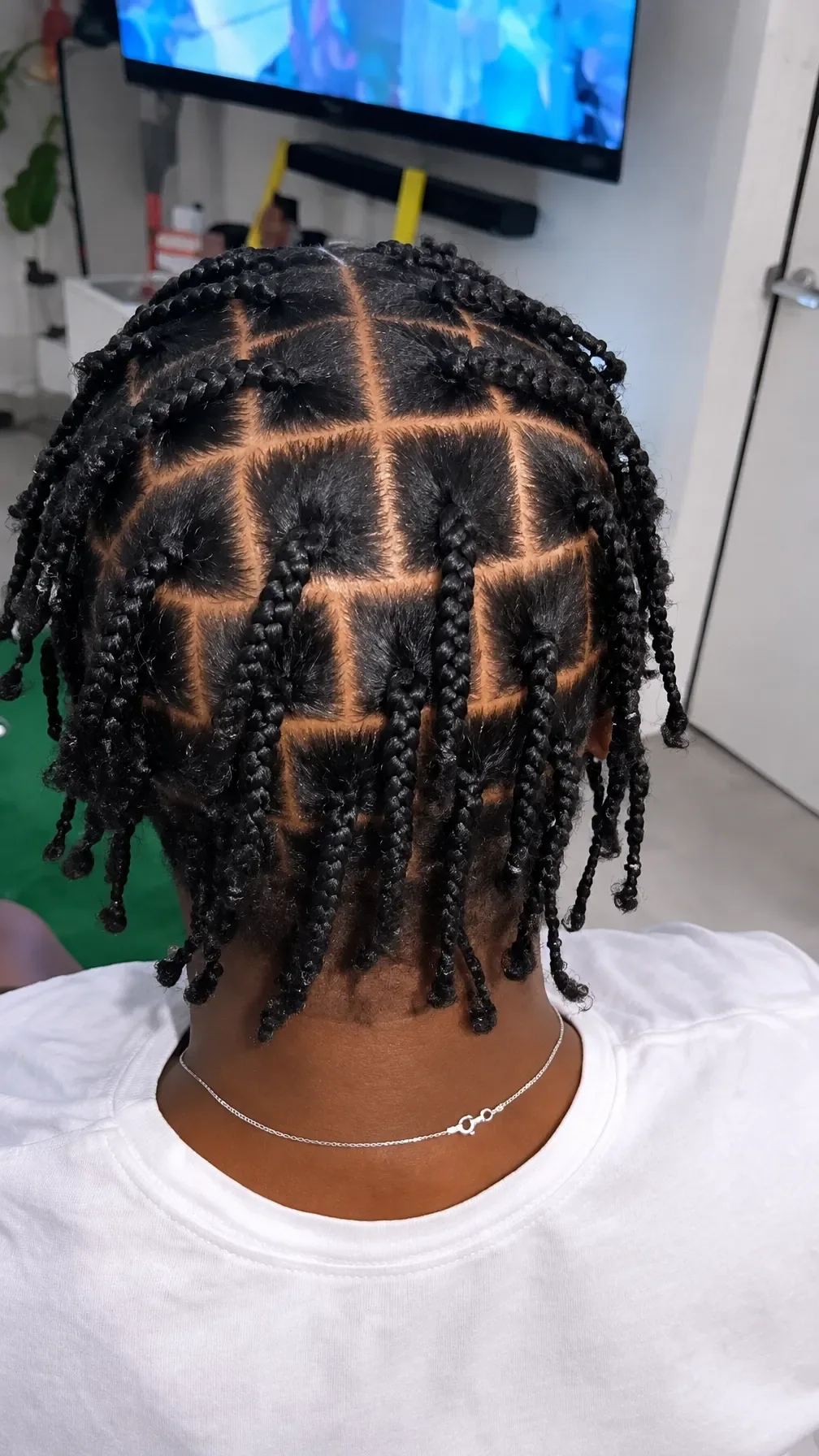 Finished long braids with a geometric back section