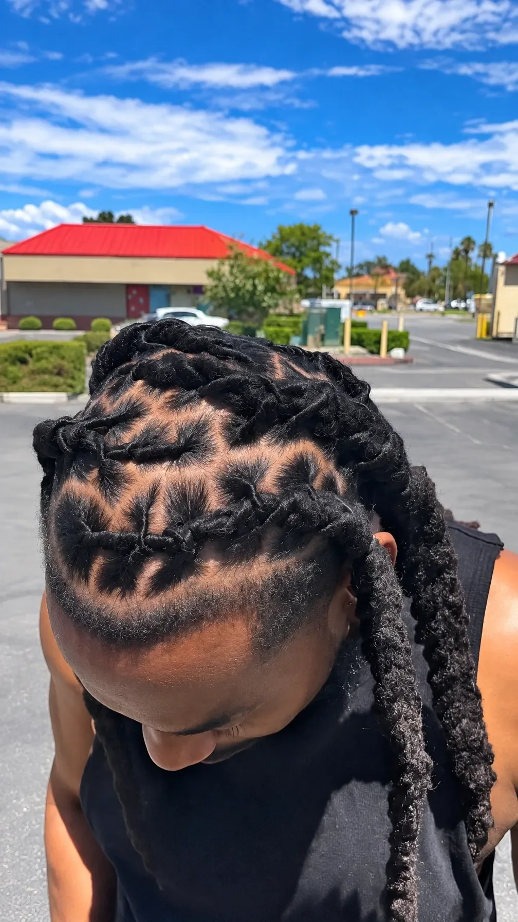 Finished braided style with an extended braid detail